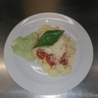 Fotografie jídla Gnocchi v rajčatové omáčce, sýr Grana Padano