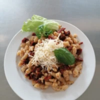 Fotografie jídla Halušky se sušenými rajčaty a parmazánem