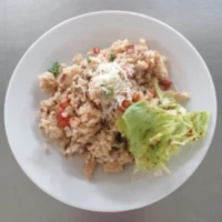 Fotografie jídla Italské kuřecí rizoto s parmskou šunkou a sušenými rajčaty